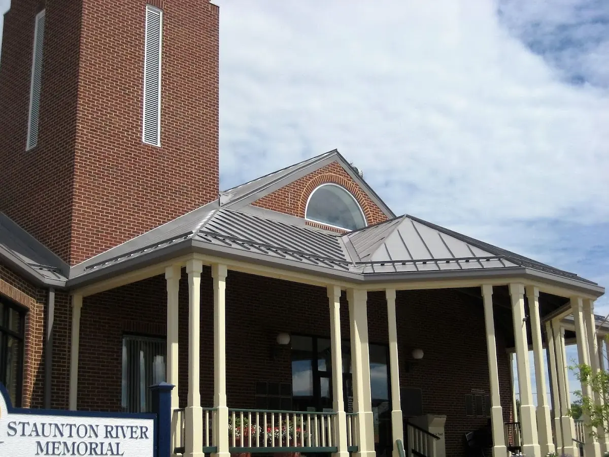 Skilled roofing craftsmen working on a residential roof in Lavallette